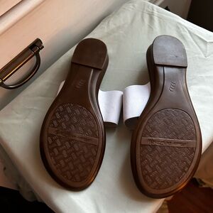Brand new size 10 never worn slip in with top separation and gold buckle